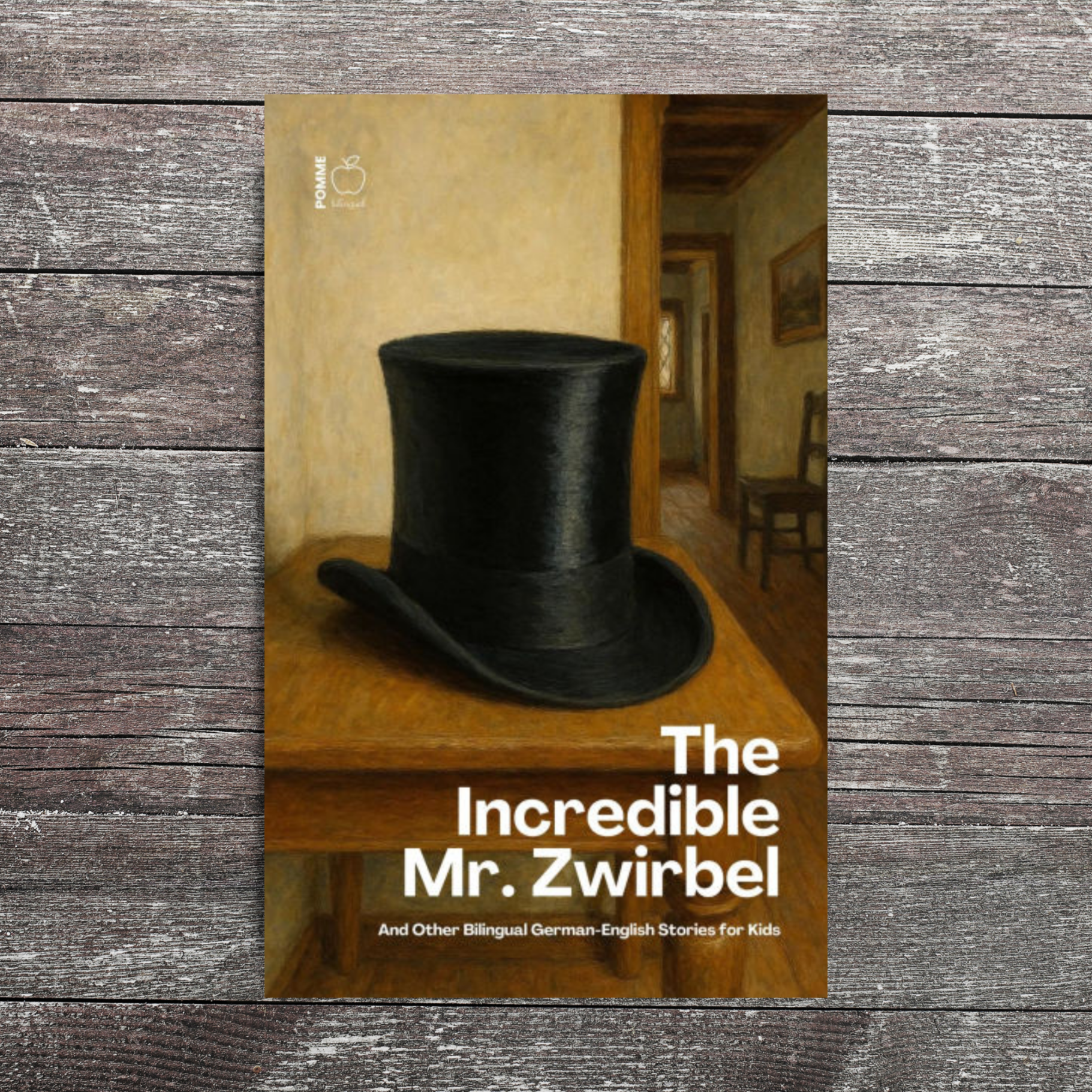 A black top hat on a wooden table in a room with a light-coloured wall.