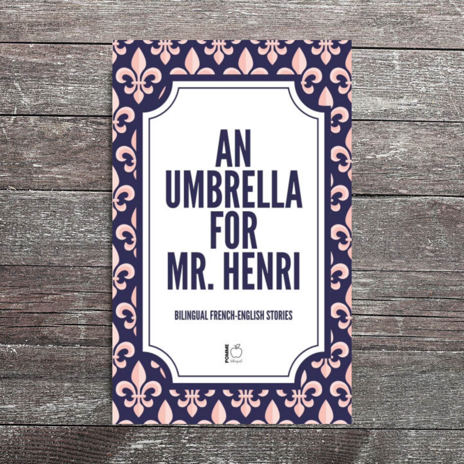 Cover of "An Umbrella for Mr. Henri" featuring ornate patterns in blue and white.