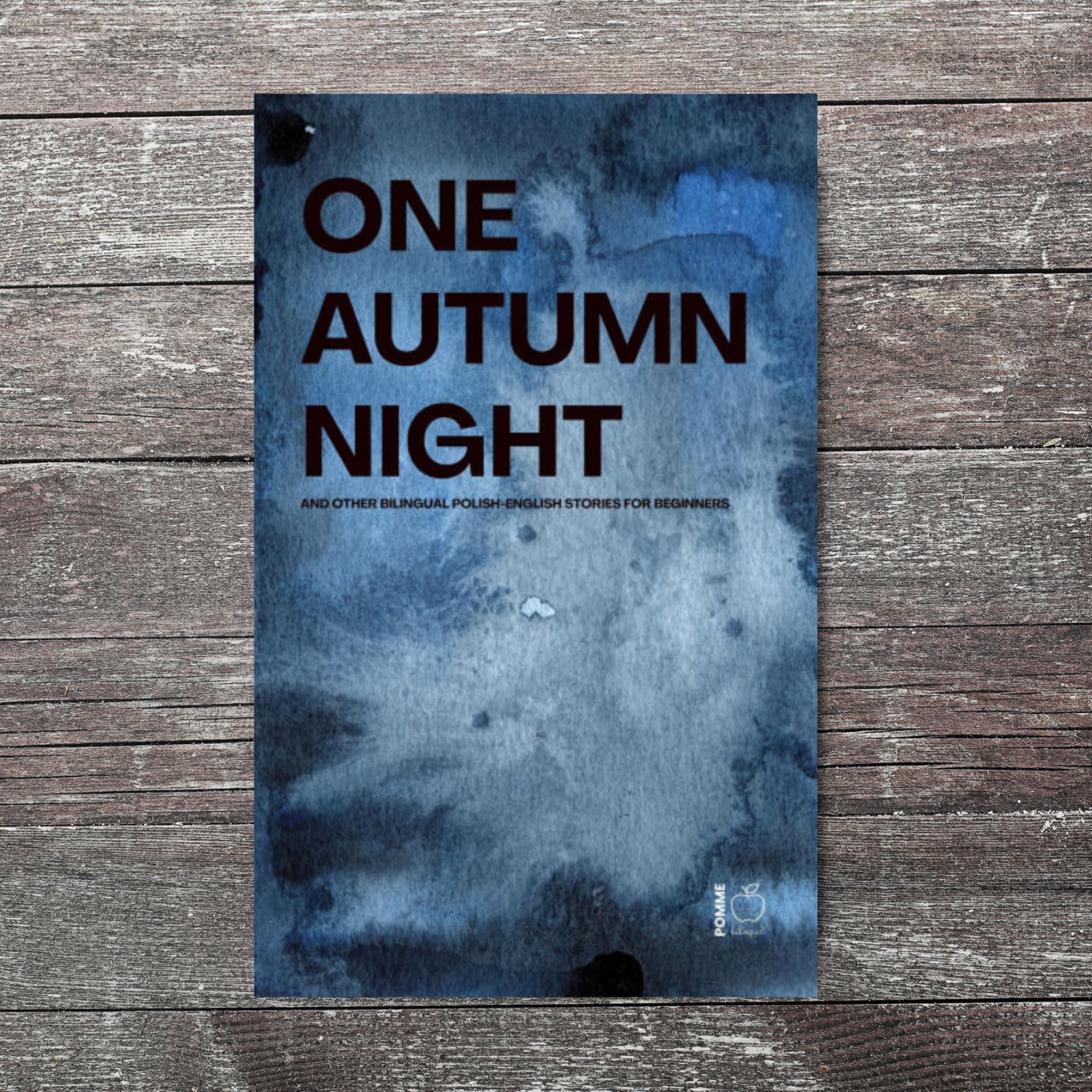 Book cover featuring the title "One Autumn Night" with a blue watercolour background.