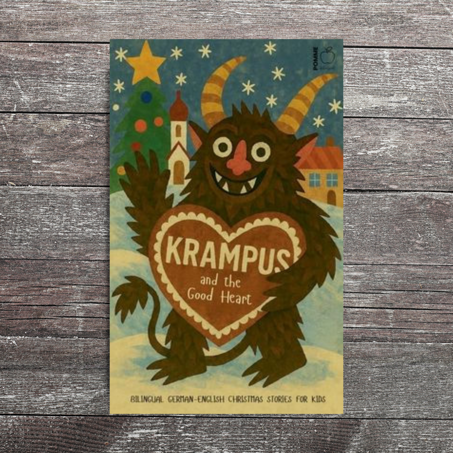 Cover illustration of "Krampus and the Good Heart," featuring a friendly monster holding a heart.