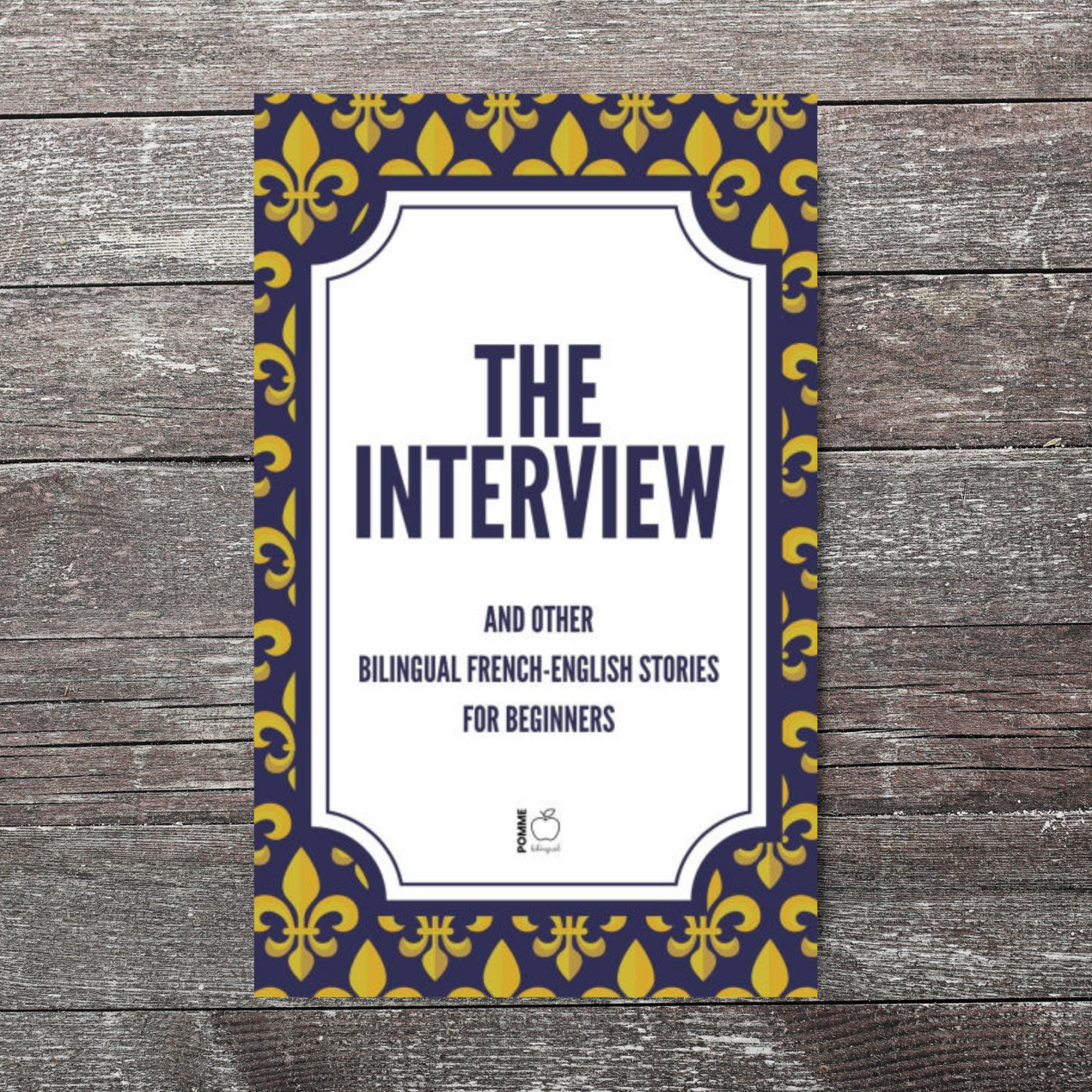 Book cover with the title "The Interview" and a decorative border in blue and gold.
