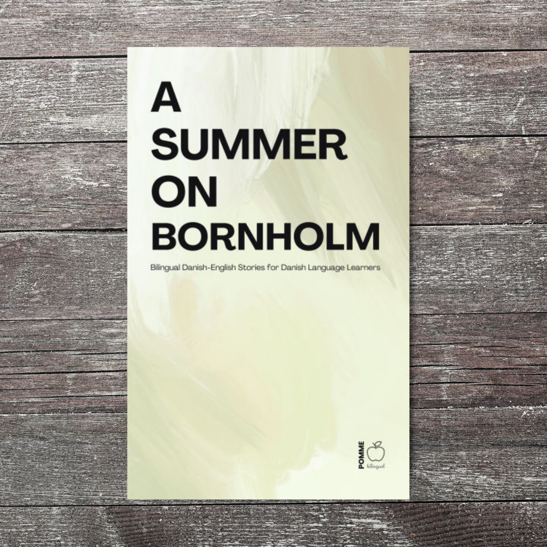 Book cover titled "A Summer on Bornholm" with a soft, abstract background.